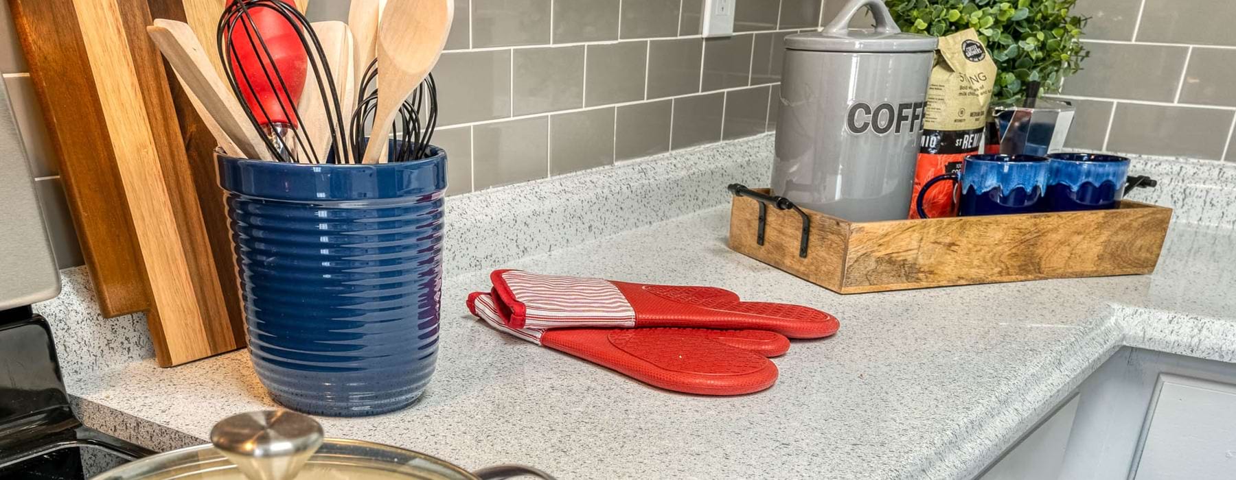 Kitchen countertop with cooking utensils 